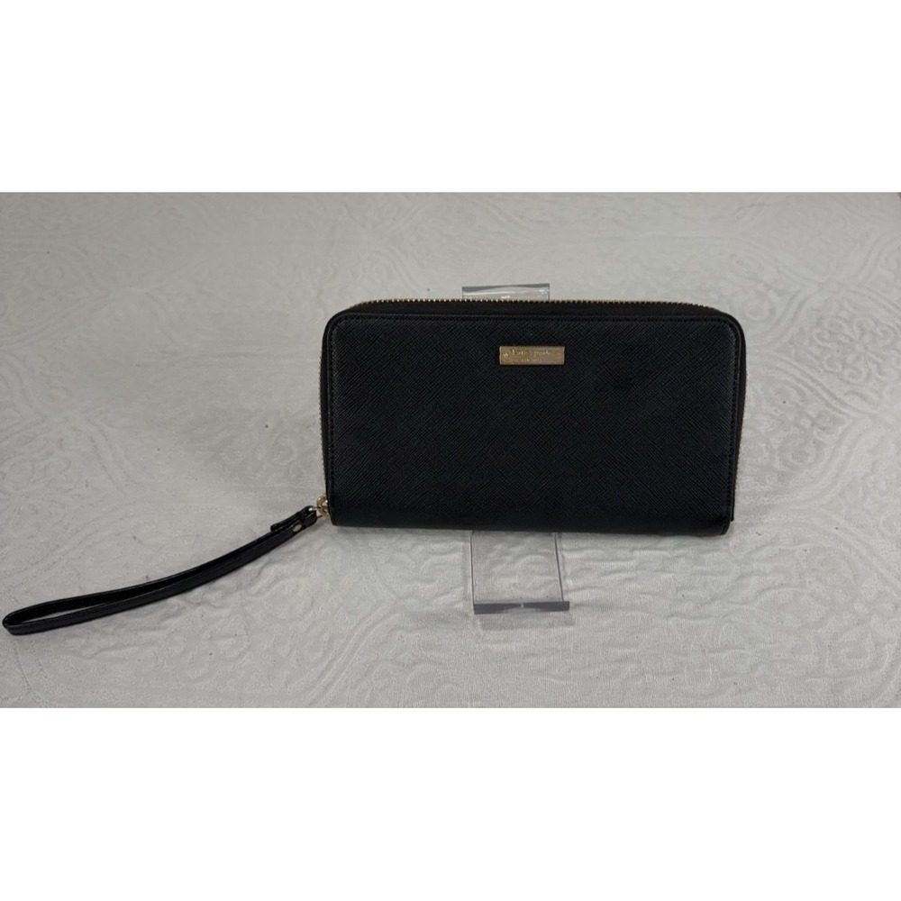 Kate Spade Black leather zip around wallet with striped print inside